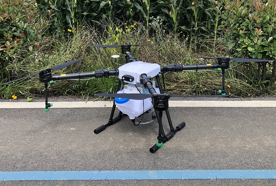 High Efficiency 4-Axis Agricultural Spray Drone with Motor Engine Pump Core Components High Automation